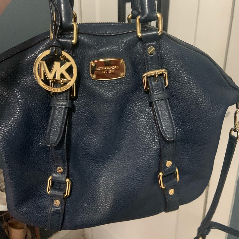 Michael Kohr’s Navy Blue Purse lightly worn